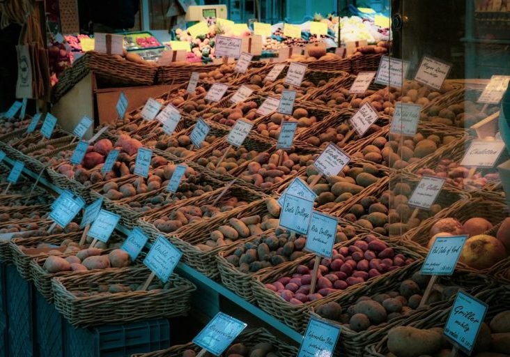 potatoes in baskets placed on stand